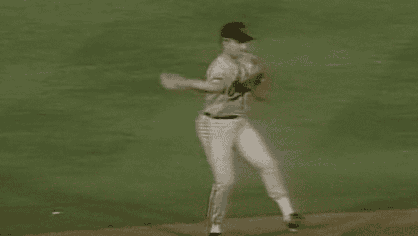 Cal Ripken Jr. showcasing his skills, representing the best players of the 1980s.